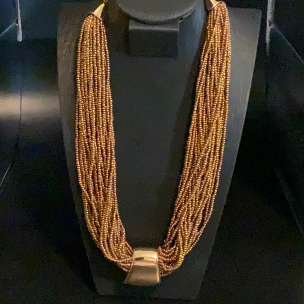 Vintage bronze colored beaded fashion necklace.